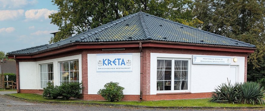 zeigt Außenansicht der Gaststätte